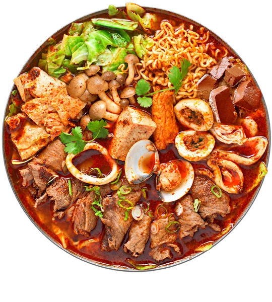 A bubbling hot pot filled with vegetables, noodles and other favorite ingredients.